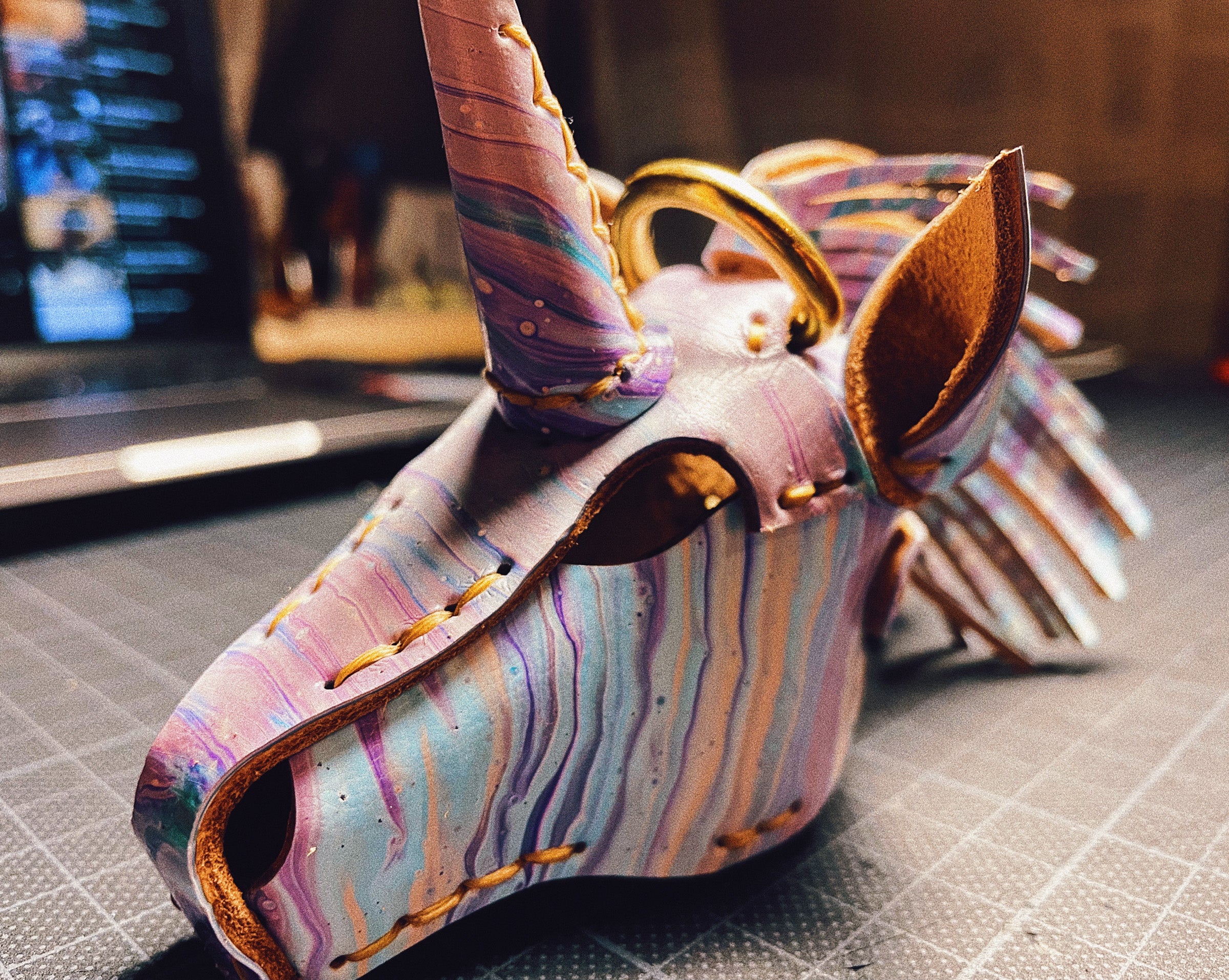 Colorful unicorn-shaped leather object